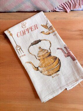 Vintage printed linen tea towel colonial-era brass and copper items
